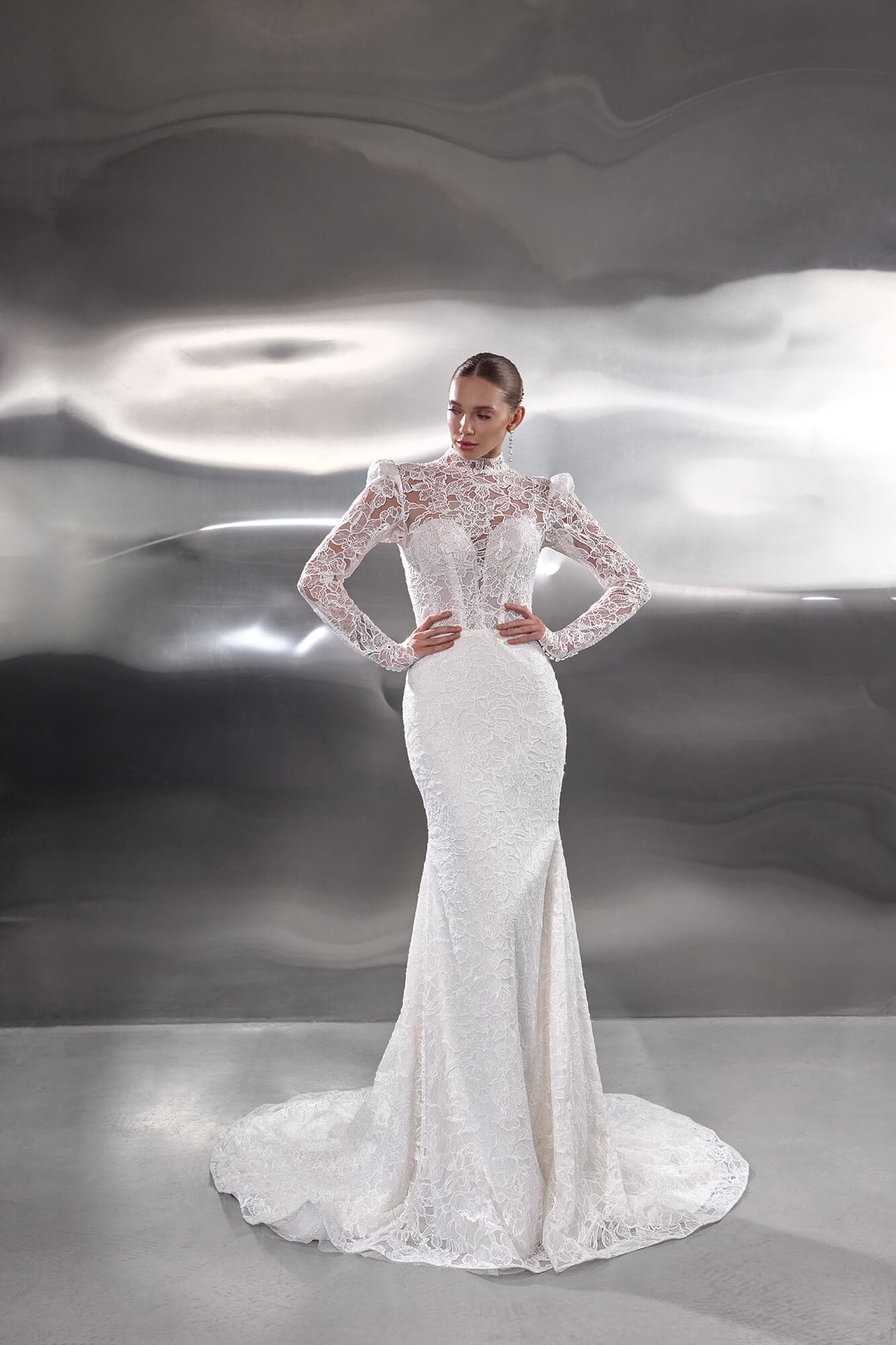 Elegant A-line wedding dress Leonie featuring a structured corset, flowing skirt and timeless minimalist bridal design.